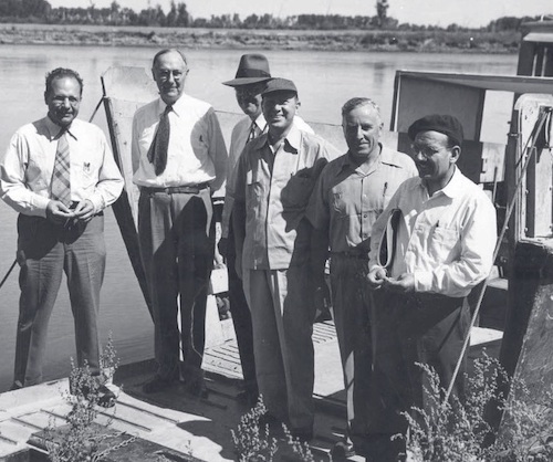 Hans Albert Einstein, far left, and Vito Vannoni, far right, serving on Army Corps of Engineers sedimentary advisory board, circa 1950. Corps of Engineers, Fort Peck District Photo