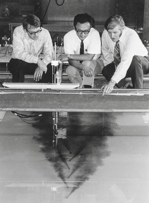 From left, John List, Robert Koh, and Brooks in the Keck flume lab, 1973. Caltech Archives Photo