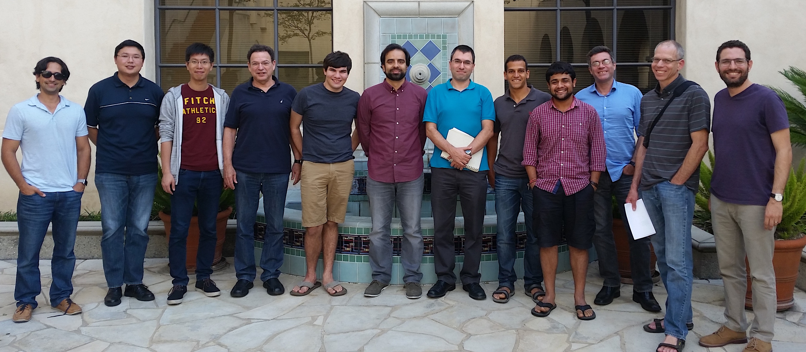 Past and present students and postdocs join Shuki for a Paradise Workshop group photo in front of the Moore Laboratory on the Caltech campus, c. 2015. Photo courtesy of Shuki Bruck