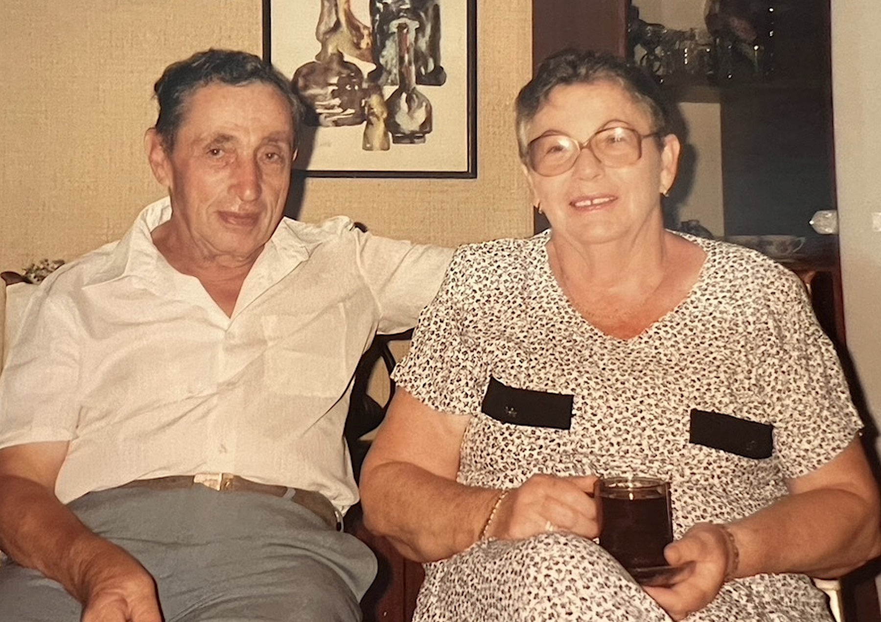 Shuki’s parents, Moshe and Sara Bruk, at home at Kiryat Haim in the early 1990s. Photo courtesy of Shuki Bruck