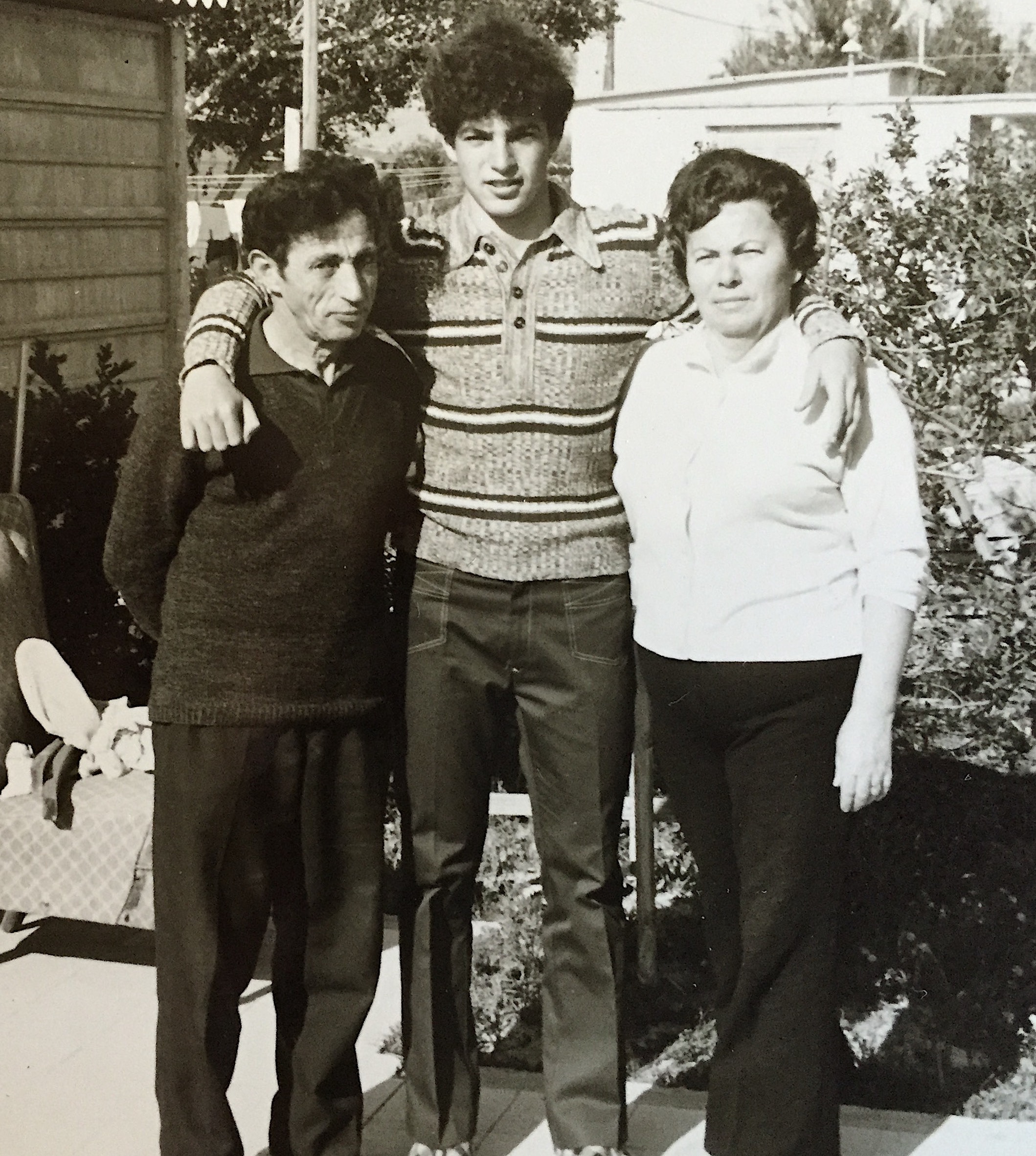 With parents during high school years. Photo courtesy of Shuki Bruck