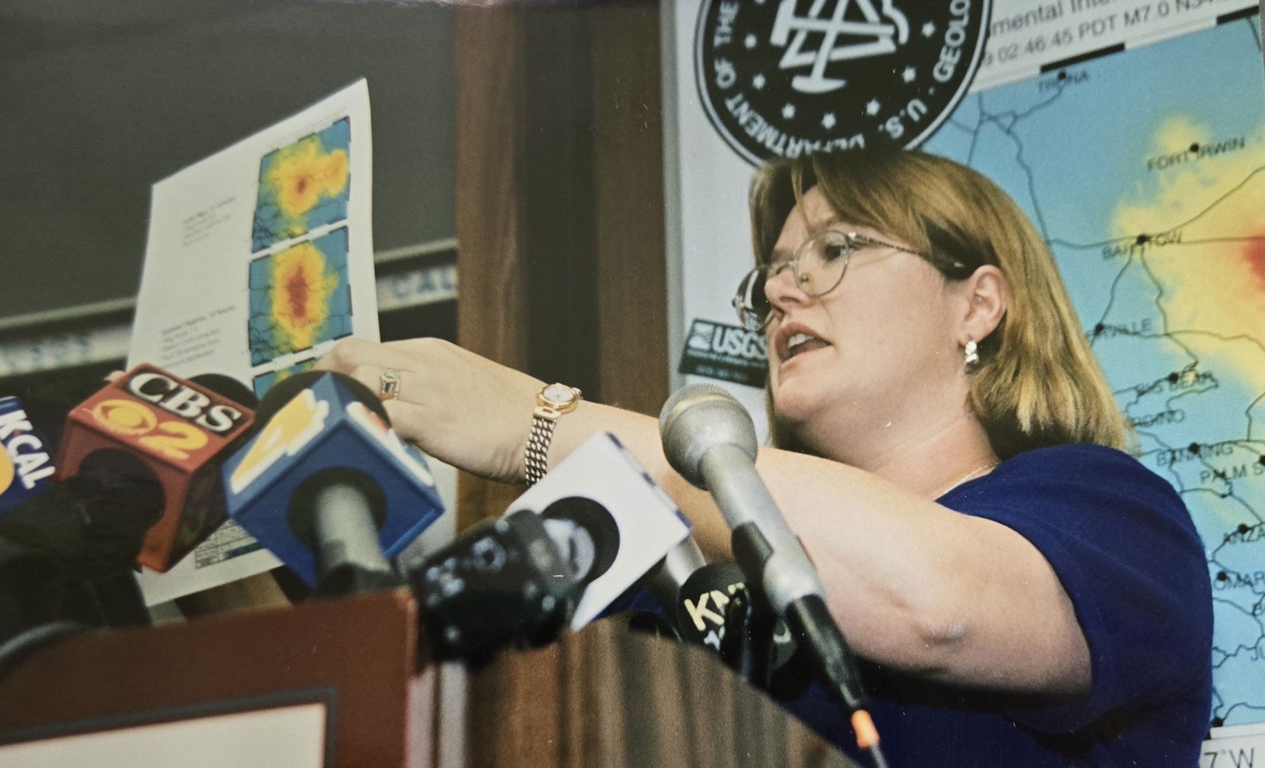 Explaining the seismic data depicted on the TriNet ShakeMap of the Hector Mine earthquake. Caltech photo by Robert Paz