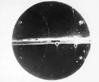 Cloud chamber photo of tracks of a positron
