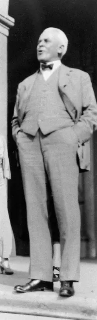 Robert A. Millikan, with hands in pockets