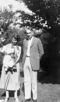 Dr. and Mrs. Richard Chace Tolman with their dog