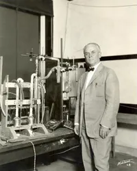 Robert A. Millikan with vacuum spark spectrograph