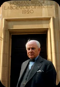 Robert A. Millikan at the entrance to the Norman Bridge Laboratory of Physics.