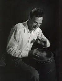 Richard Feynman playing the conga drum [trimmed photo]