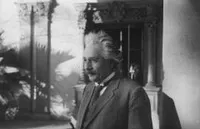 Einstein in front of Athenaeum, profile