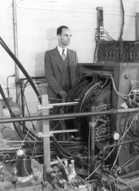 Carl Anderson standing with equipment