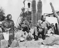 Einstein and Elsa in Palm Springs with cactus