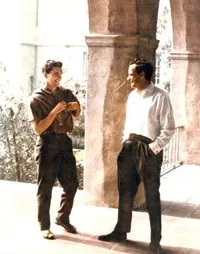 Richard Feynman chatting with a student on the campus