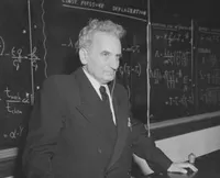 Theodore von Karman standing before a blackboard