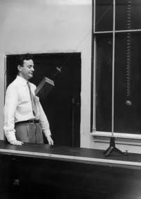 Richard Feynman with swinging object