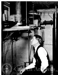 Charles C. Lauritsen in concrete hut below x-ray tube in high volts lab