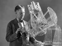 John Anderson with model of telescope