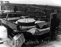 60″ grinding machine showing 45″ mirror blank with plaster inserts in back