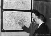 Irving Krick and W.C. Rockefeller inspecting chart