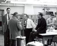 Robert Christy, Robert Bacher, C. C. Lauritsen and others in the control room of the EN Tandem Van de Graaff Accelerator, 051 Sloan