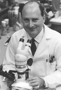 Seymour Benzer with microscope
