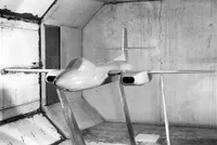 Model plane in wind tunnel