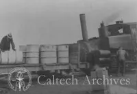 Hauling gasoline for the generator in 55-gallon drums from cogwheel railway on Pikes Peak