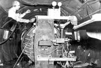 Interior of B-29 aircraft loaded with magnet cloud chamber for high-altitude cosmic-ray experiments