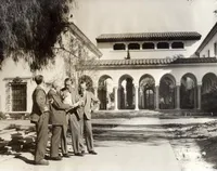 Robert Millikan with three others in front of the Athenaeum