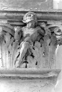Campus art, capital in student houses showing athlete, possibly a runner