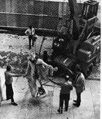 Removing the Apollo statue from Throop Hall prior to the demolition of the building