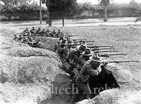 World War I: Troops firing from a foxhole