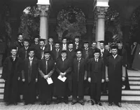 A group of graduates on the steps of the Athenaeum