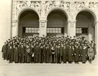 Faculty and graduates on the steps of Throop Hall