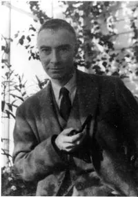 J. Robert Oppenheimer standing with pipe in hand