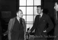 Unknown man with Paul Dirac and J. Robert Oppenheimer